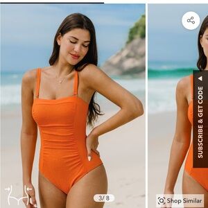 Brand new orange one piece! Tags still on.